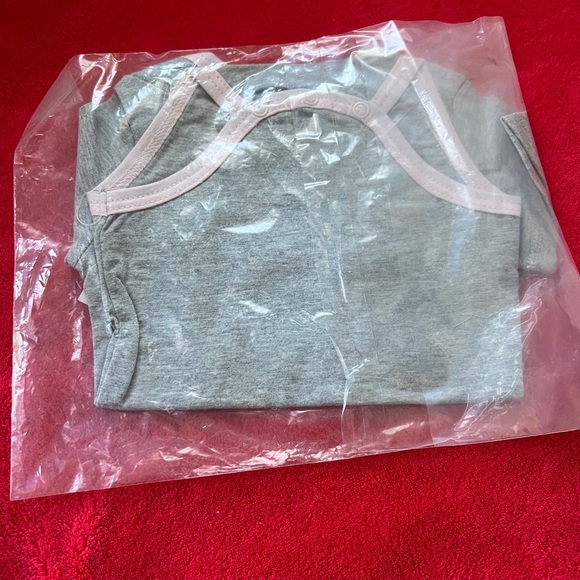 Brand new skull printed onsie. - Picture 2 of 3